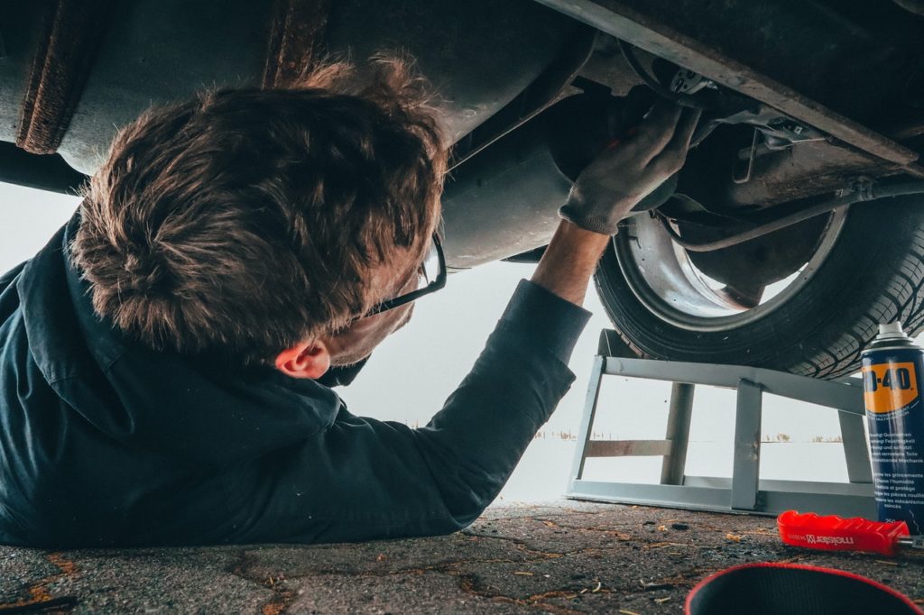 the cause of writers block image-mechanic under car image