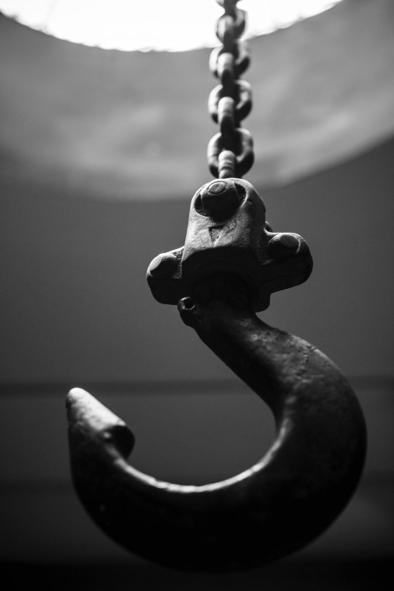 hook on chain greyscale image