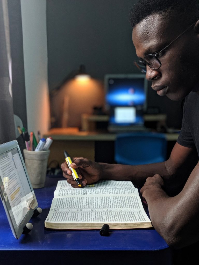 man reading a book-man studying image